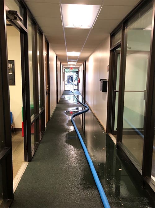 office building water damage being repaired by Carolina Water Damage Restoration